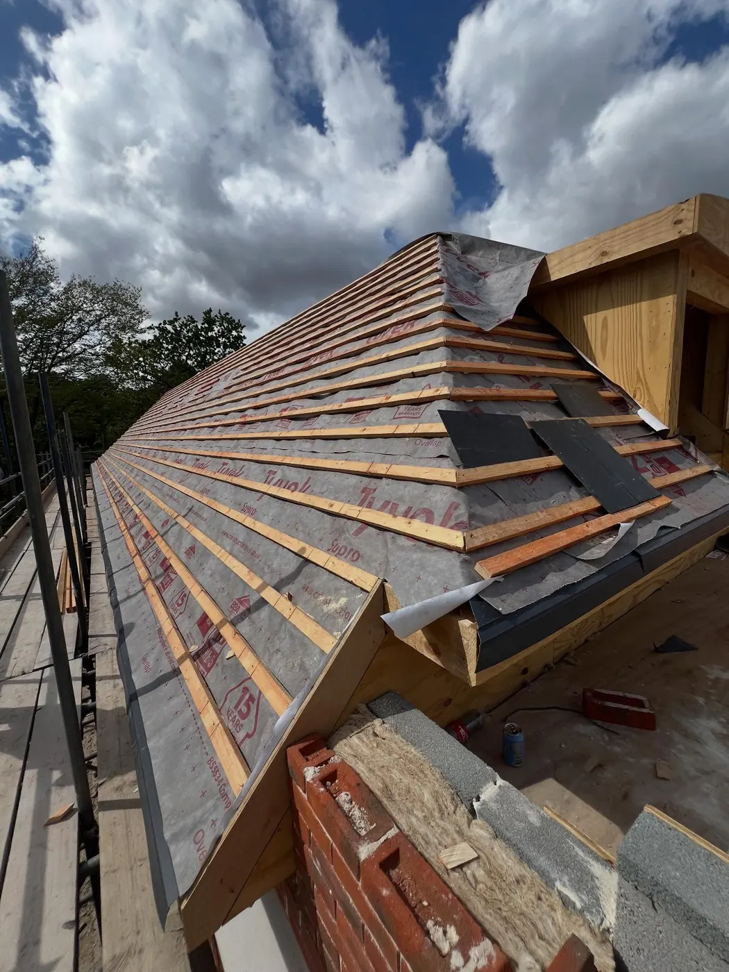 Roof battens and underlay on a hipped roof ready for slating