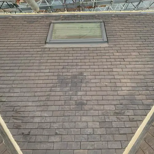 Slate roof with a Velux roof window