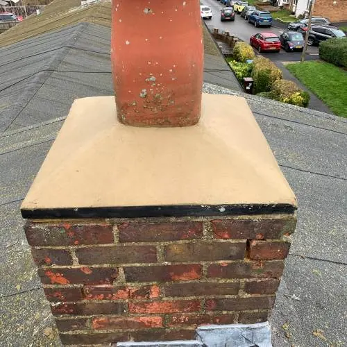 Chimney stack with new lead flashing and cap