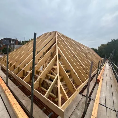 Cut timber hipped roof structure on a new build