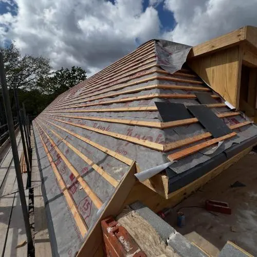 Roof battens and underlay on a hipped roof ready for slating