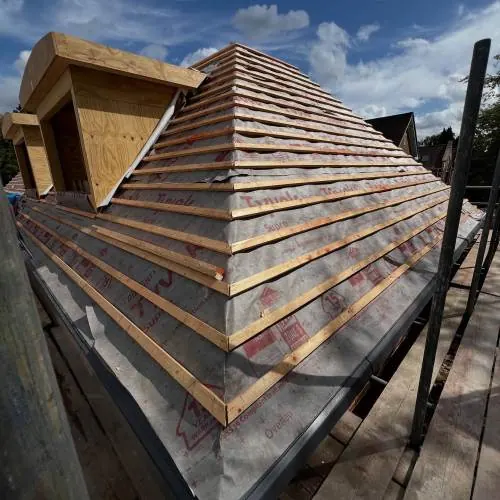 Dormer and hipped roof battened ready for slate in Essex