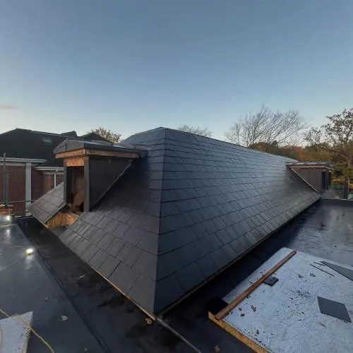 New slate roof with dormer on a residential project