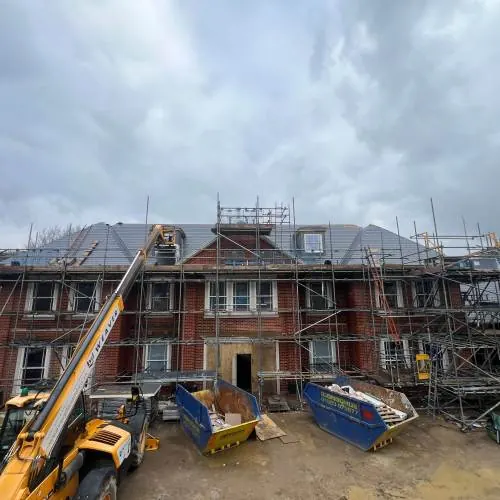 Large period-style building with scaffolding during a roof refurbishment